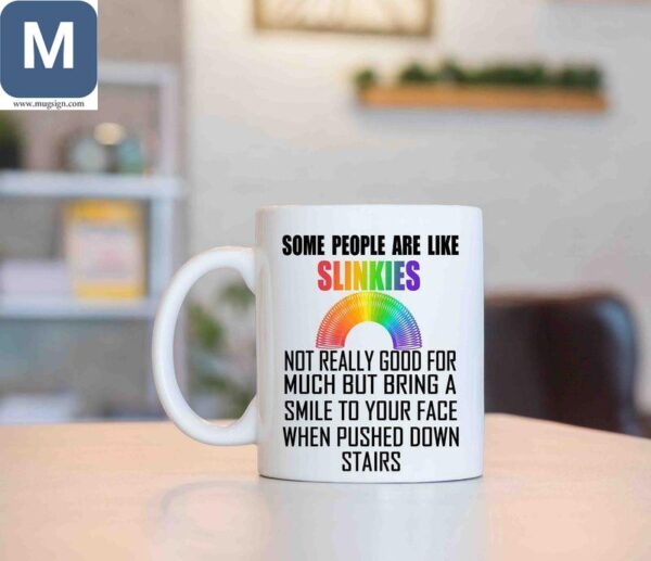 Some People Are Like Slinkies Not Really Good For Much But Bring A Smile To Your Face When Pushed Down Stairs Funny Slinky Coffee Cup Novelty Gift Mugs